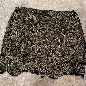EUC.  Black and gold miniskirt.